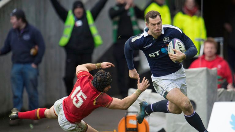 Tim Visser beats Leigh Halfpenny to score Scotland's second try