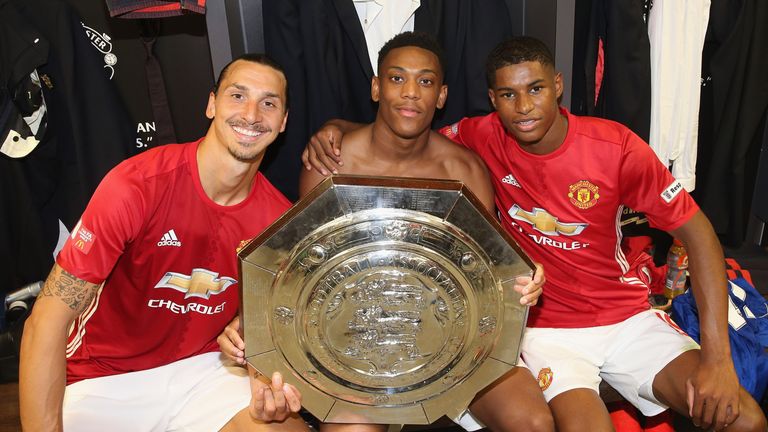 Ibrahimovic (L), Anthony Martial (C) and Rashford (L) with the Community Shiedl