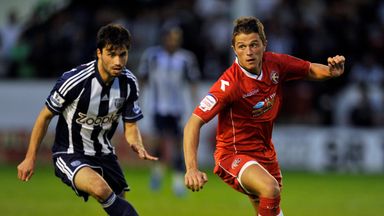 Image of Florent Cuvelier (R) has signed a new Walsall deal