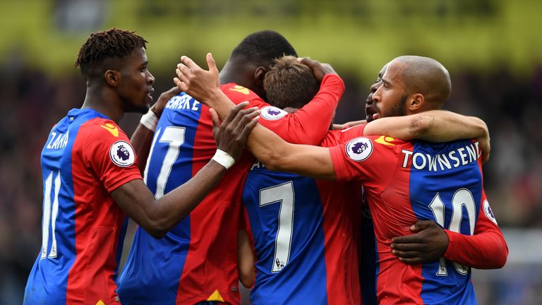 Yohan Cabaye (middle) celebrates with his team-mates