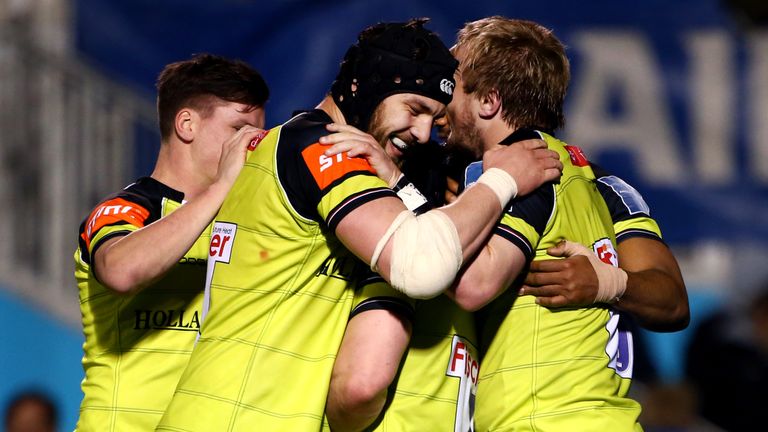 Luke Hamilton celebrates his try with his Leicester team-mates