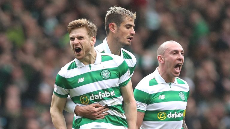 Stuart Armstrong celebrates his first-half strike at Celtic Park