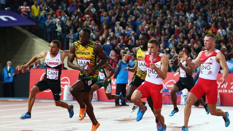 Usain Bolt competing in the 4x100m relay final at the 2014 Commonwealth Games