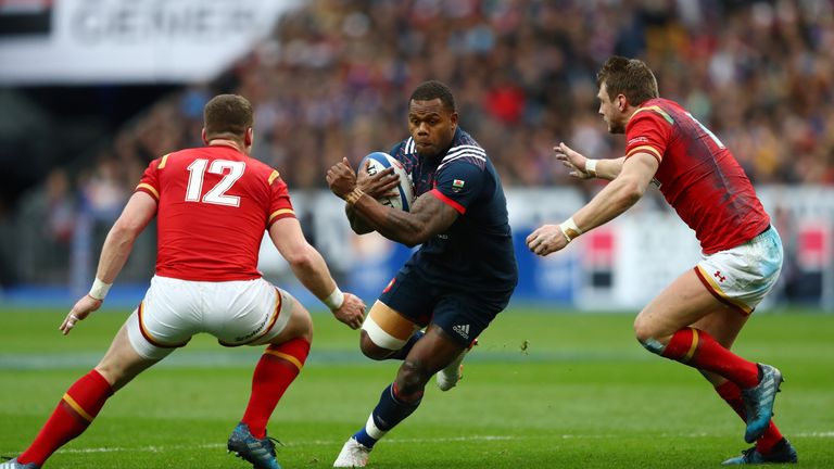 Virimi Vakatawa of France is tackled by Scott Williams and Dan Biggar