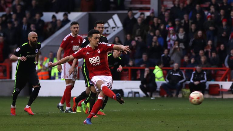 Zach Clough scores his side's third goal from the penalty spot