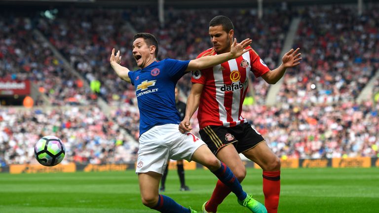 Ander Herrera is challenged by Jack Rodwell in the first half