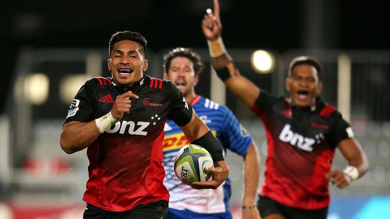 Pete Samu of the Canterbury Crusaders breaks away to score a try 