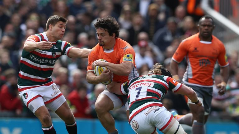 Juan Pablo Socino is tackled by Ben Youngs and Harry Thacker