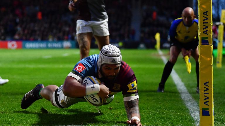Mat Luamanu of Harlequins dives over to score his side's first try