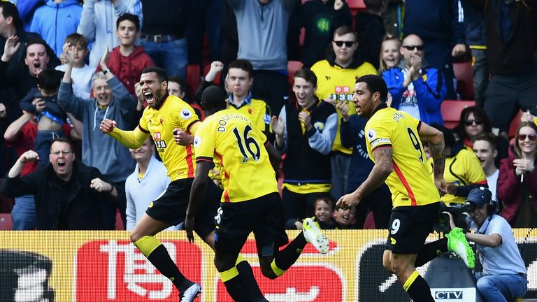 Etienne Capoue is pursued by team-mates while celebrating his goal against Swansea.