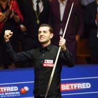 Mark Selby celebrates retaining his World Championship title in Sheffield