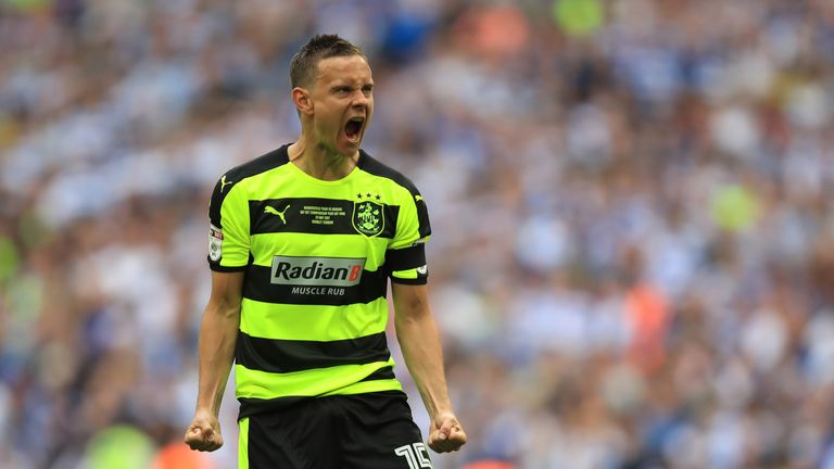Chris Lowe celebrates scoring for Huddersfield during the penalty shootout