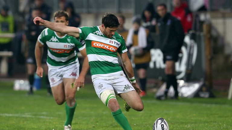 Treviso's Ian McKinley kicks at goal