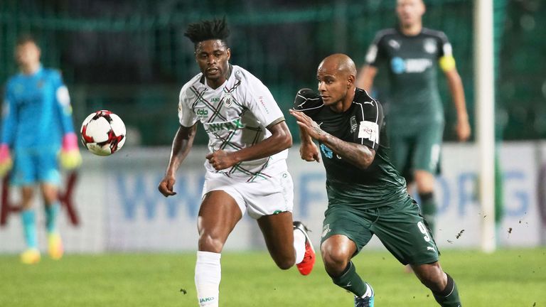 Marseille are reportedly interested in signing Rubin Kazan's Alex Song (Left)