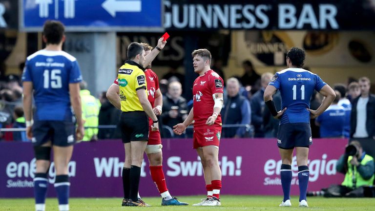 Scarlets' Steff Evans is sent off by referee Marius Mitrea after a tip-tackle on Leinster's Garry Ringrose