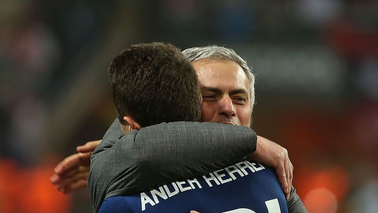 Embracing Jose Mourinho after winning the Europa League final