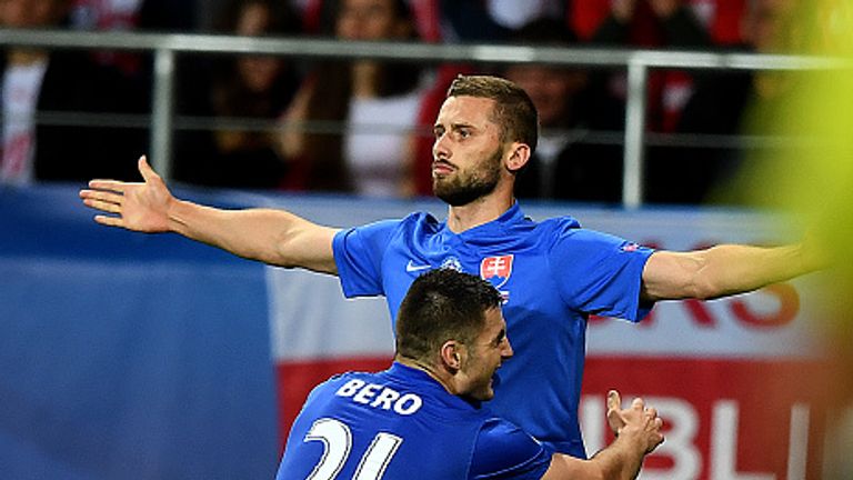 Matus Bero celebrates with Pavol Safranko