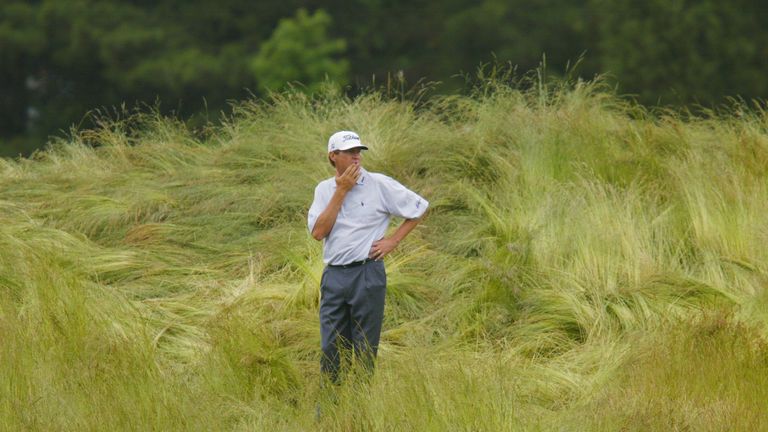 Davis Love III searching for his ball in the rough at the 10th at Bethpage Black in 2002