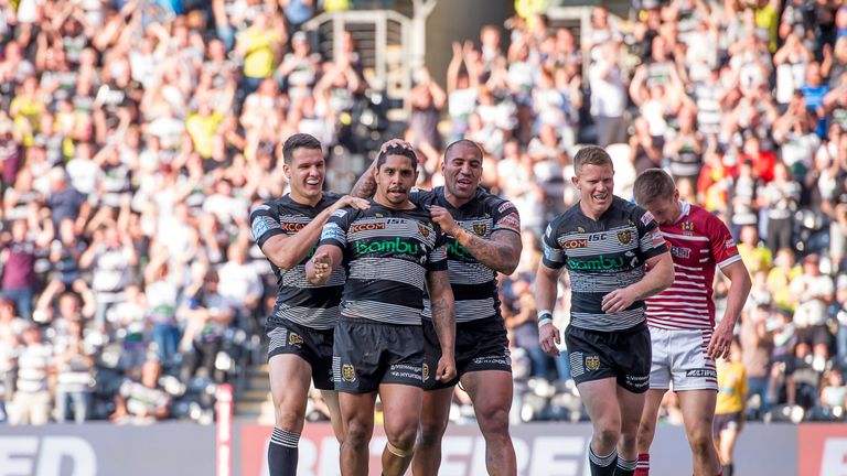 Albert Kelly is congratulated after scoring against Wigan