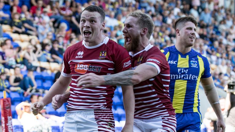 Liam Marshall and Sam Tomkins celebrate the winger's try in the Challenge Cup victory