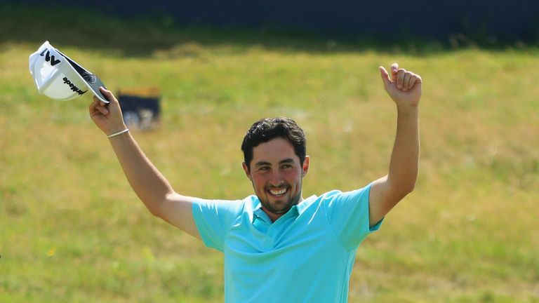 Alfie Plant walks up the 18th fairway at Royal Birkdale