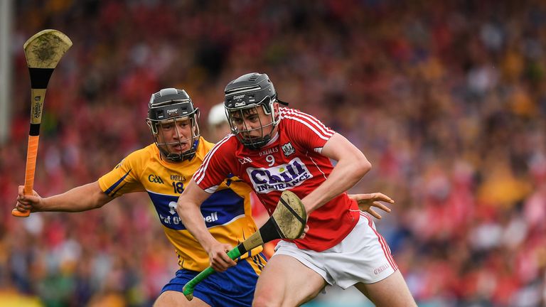 Cork's Darragh Fitzgibbon tries to get the better of Clare's  David Reidy of Clare 