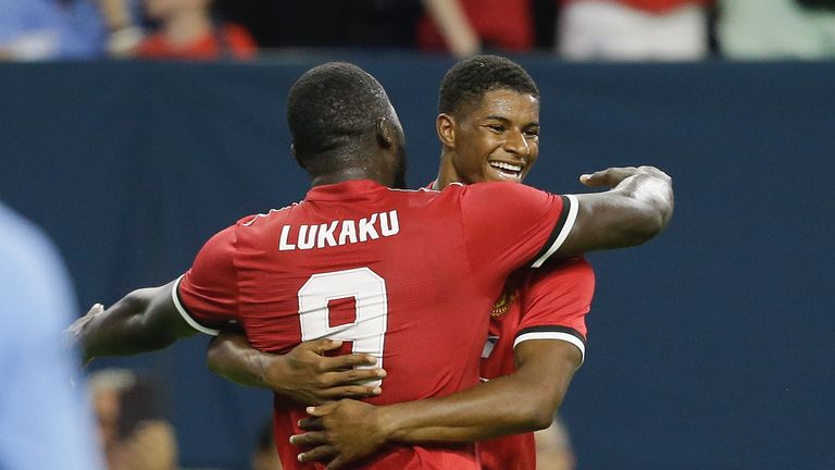 Marcus Rashford celebrates his goal with Lukaku