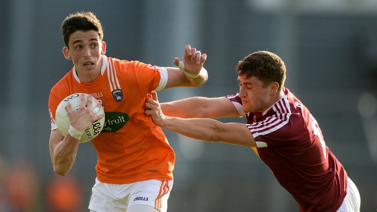 Rory Grugan of Armagh in action against Kelvin Reilly of Westmeath