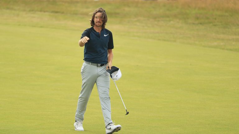 Tommy Fleetwood waves to the galleries on the 18th fairway at Royal Birkdale