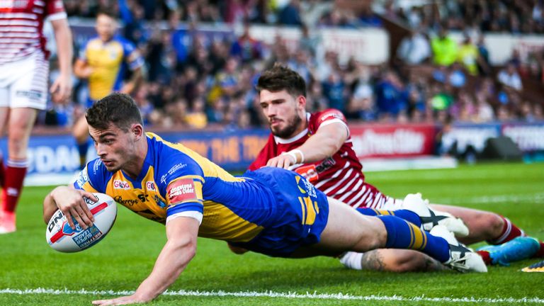 Stevie Ward dives over to score his first try