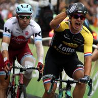 Dylan Groenewegen stood firm to survive a late burst of attacks