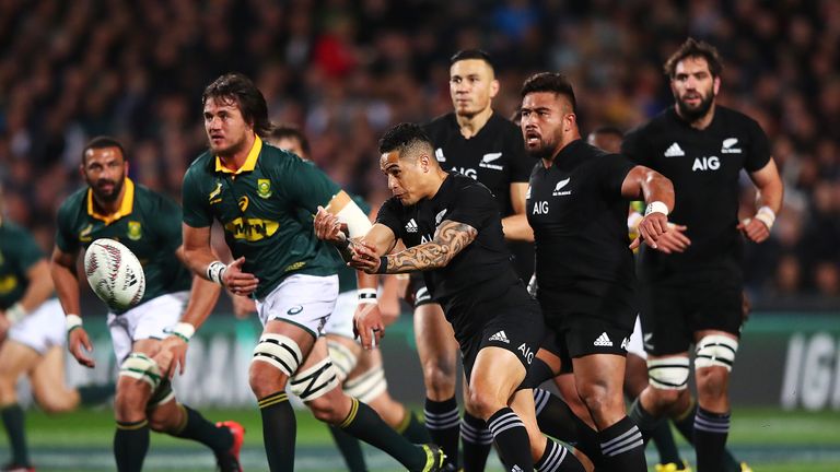New Zealand's Aaron Smith passes the ball out during the Rugby Championship match against South Africa