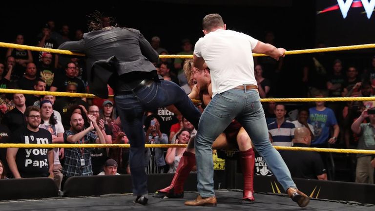 Pete Dunne received a beating from Adam Cole and Bobby Fish before leaving Wolfgang to face them alone