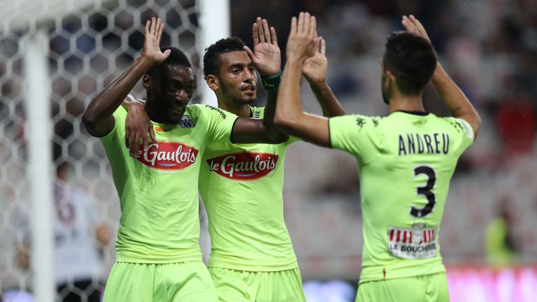 Karl Toko Ekambi (left) is reportedly a target for several Premier League clubs