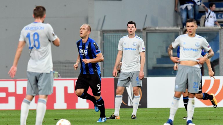 Andrea Masiello wheels away after opening the scoring against Everton