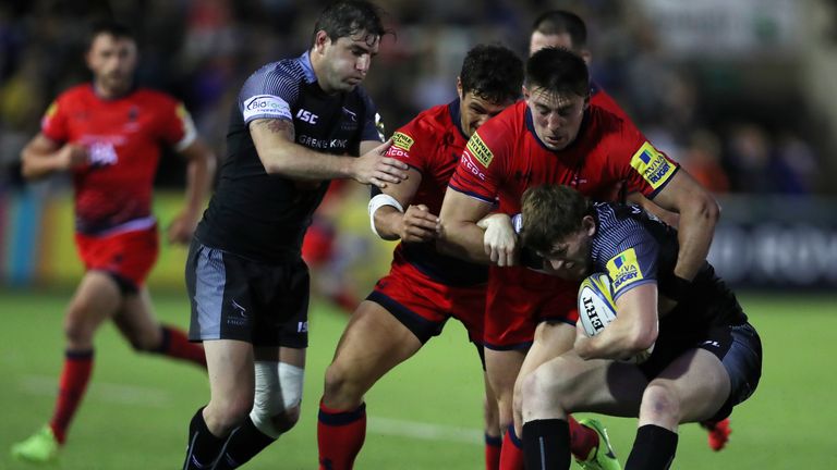 Simon Hammersly is tackled by a Worcester defender