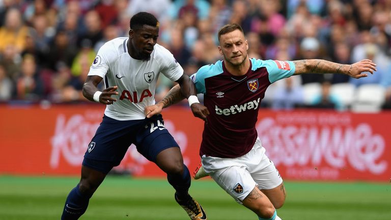 Serge Aurier (left) was sent off for Tottenham