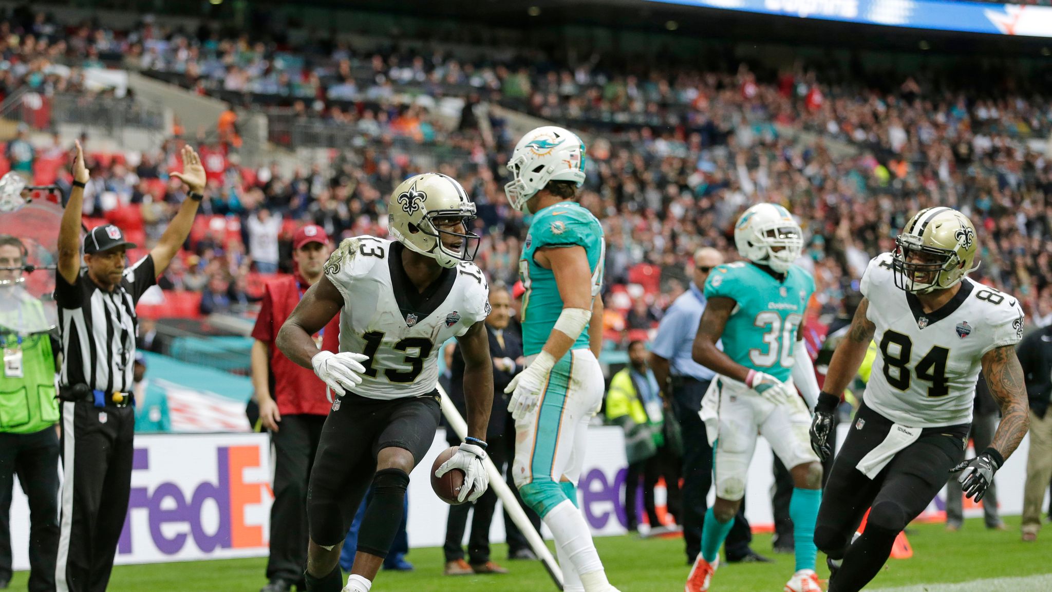 New Orleans Saints and Miami Dolphins fans prior to the NFL International  Series match at Wembley Stadium, London Stock Photo - Alamy