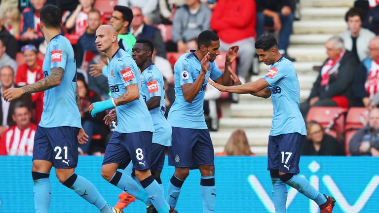 Ayoze Perez is congratulated after restoring Newcastle's lead