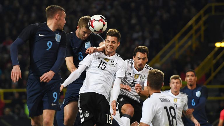 Man City are eyeing a move for Julian Weigl (centre)