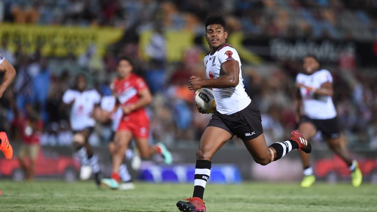 Joe Lovadua races away to score for Fiji