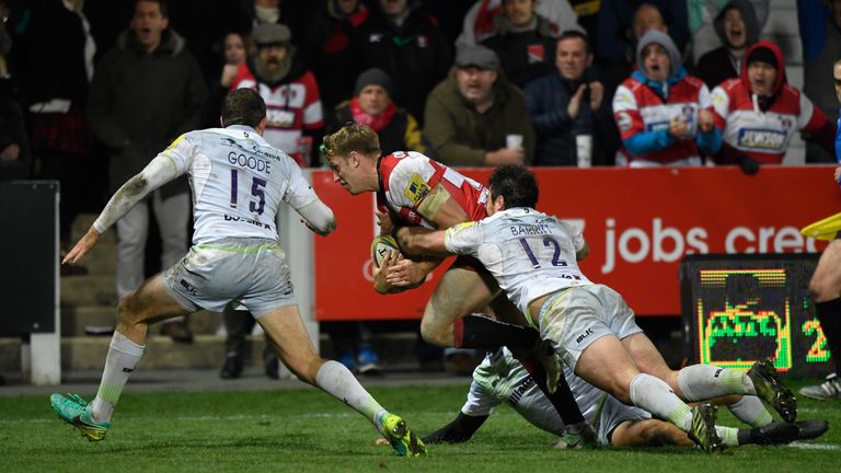 Gloucester wing Ollie Thorley goes over to score the first try for the hosts