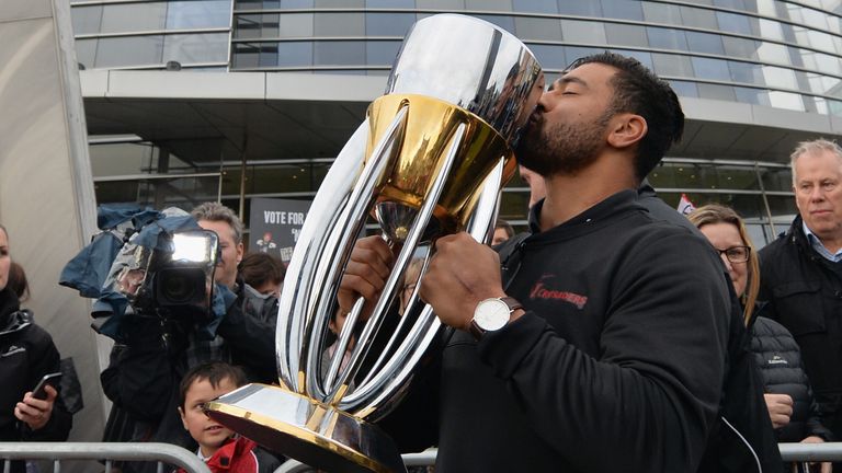 Richie Mo'unga of the Crusaders kisses the Super Rugby trophy during a parade at Christchurch Art Gallery last year
