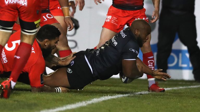 Beno Obano crashes over for Bath's opening try in the first minute