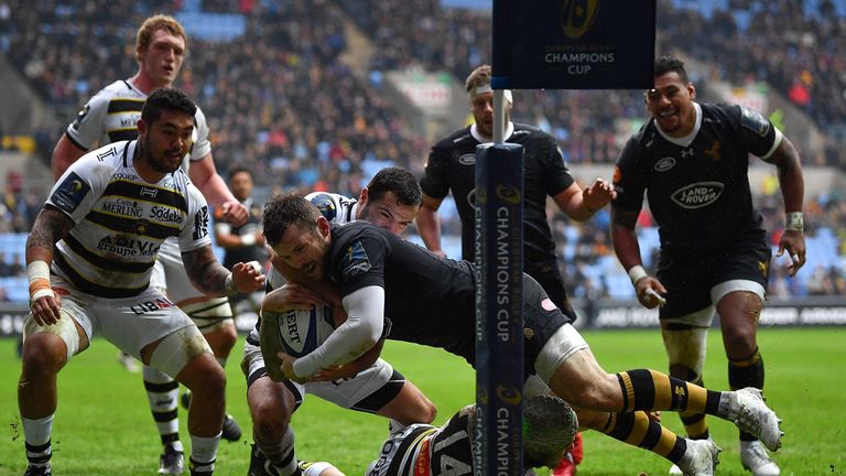Elliot Daly of Wasps dives over to score the first of his two tries before departing through injury