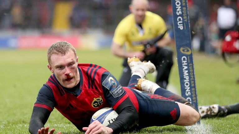 In-form winger Keith Earls crosses in the corner for Munster