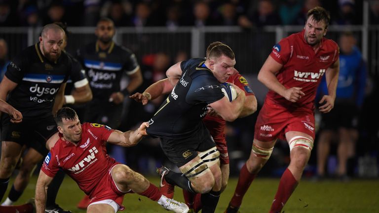  Sam Underhill  tries to get away from Gareth Davies 