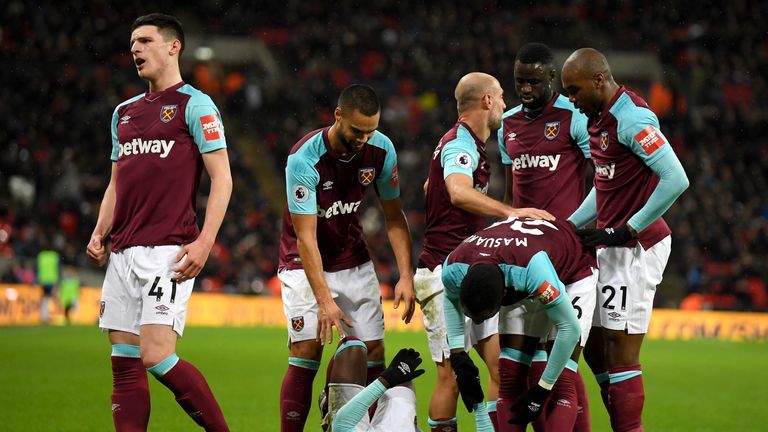 LONDON, ENGLAND - JANUARY 04: Pedro Obiang of West Ham United (grounded) celebrates with teammates after scoring his sides first goal during the Premier L