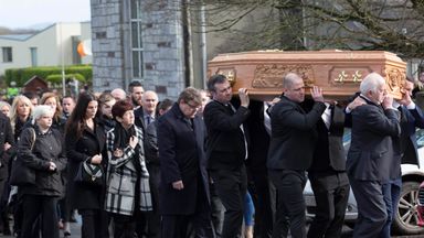 Image of Mourners attend the funeral of former Celtic and Manchester United footballer Liam Miller