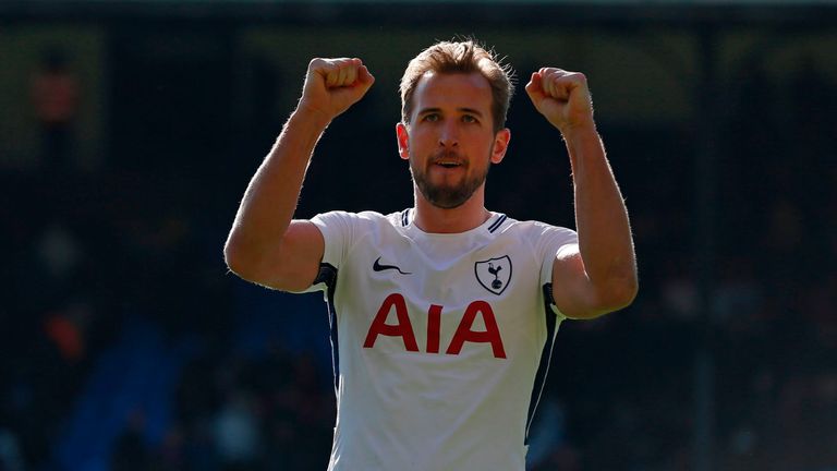Harry Kane celebrates after winning the game for Tottenham on Sunday